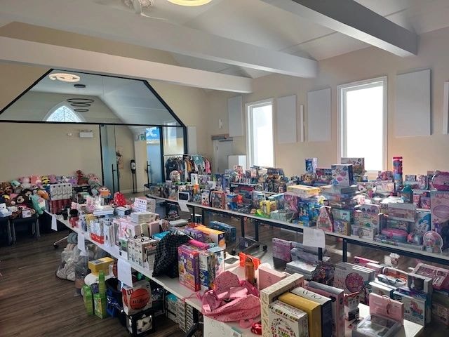 Christmas assistance program gifts and community celebration